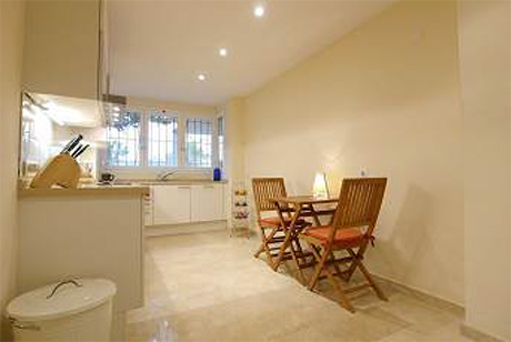 cabopino apartment kitchen view image